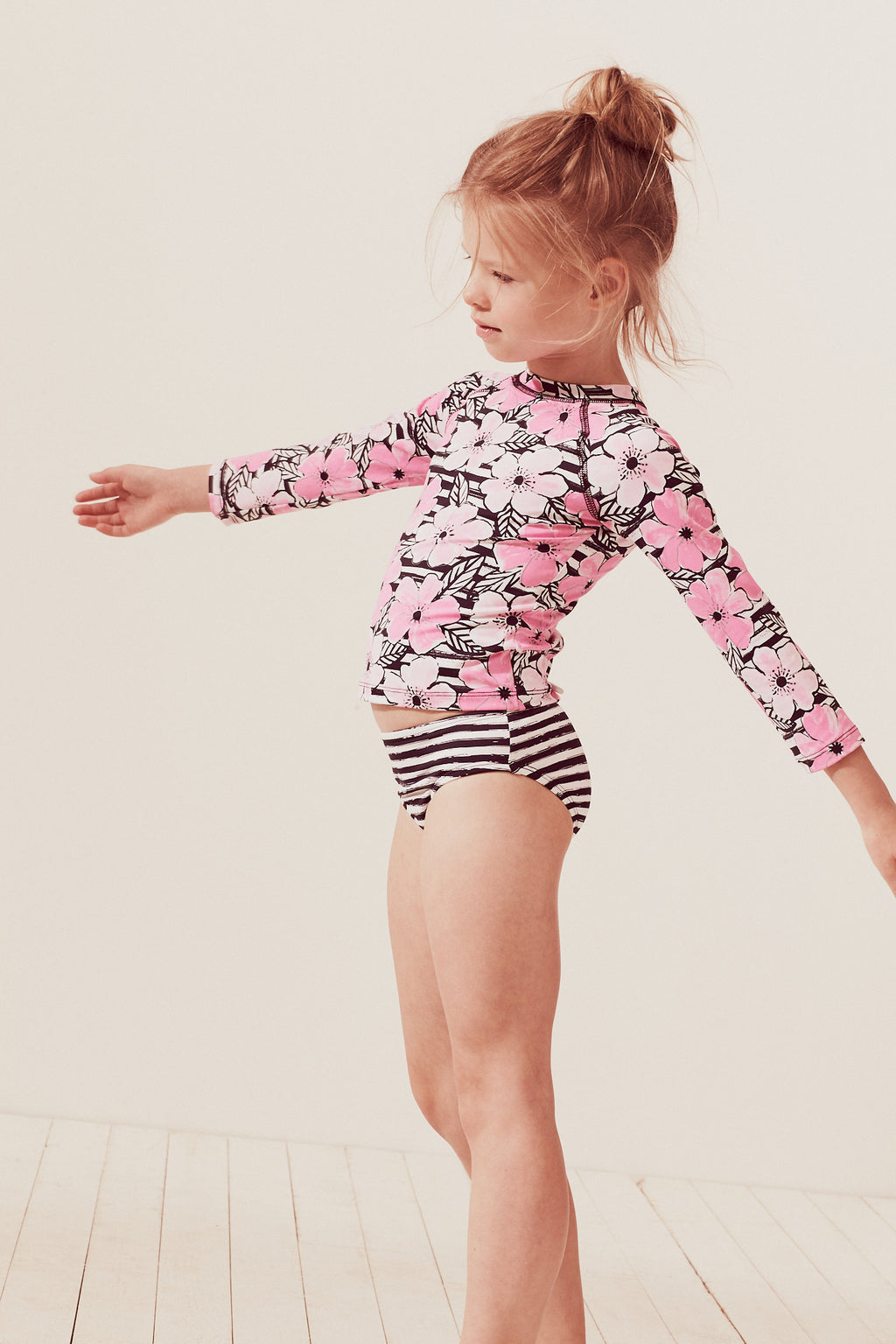 Pepita Makani girl's two-piece printed swimsuit in pink